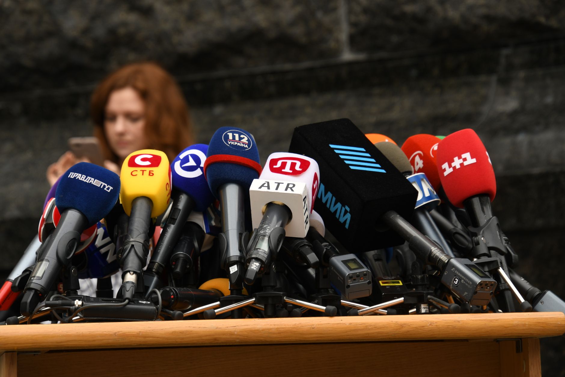 Press conference podium setup microphones
